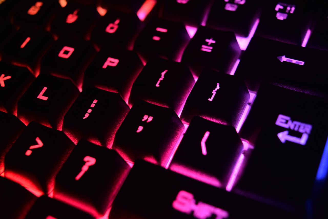 Crafting Captivating Headlines: Your awesome post title goes here Vibrant close-up of a modern RGB backlit mechanical keyboard with glowing keys.